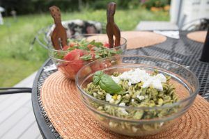 summer picnic salads set out on a table