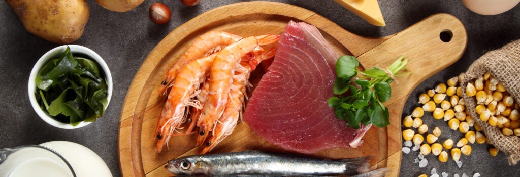 foods containing iodine, including a variety of fish, shellfish, iodized salt, milk, seaweed, nuts, seeds, potatoes, beans, eggs and a variety of dairy products including milk, cheese and yogurt.