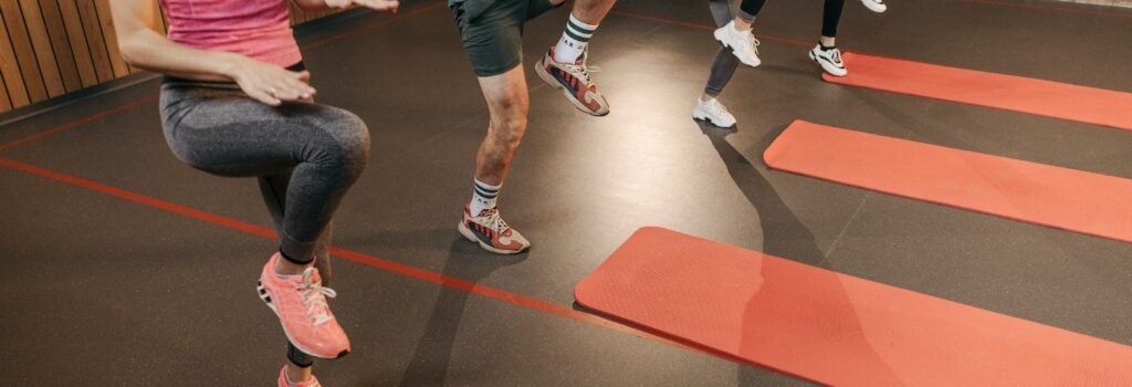 people in a HIIT workout class