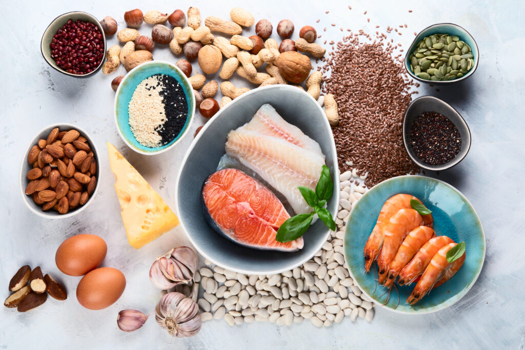 foods containing phosphorus, including nuts and seeds, salmon, eggs, cheese