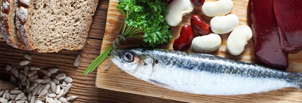 a variety of copper-rich foods including nuts, seeds, beans, fish, whole grains, and organ meat