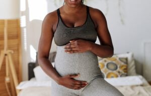 pregnant woman doing yoga 