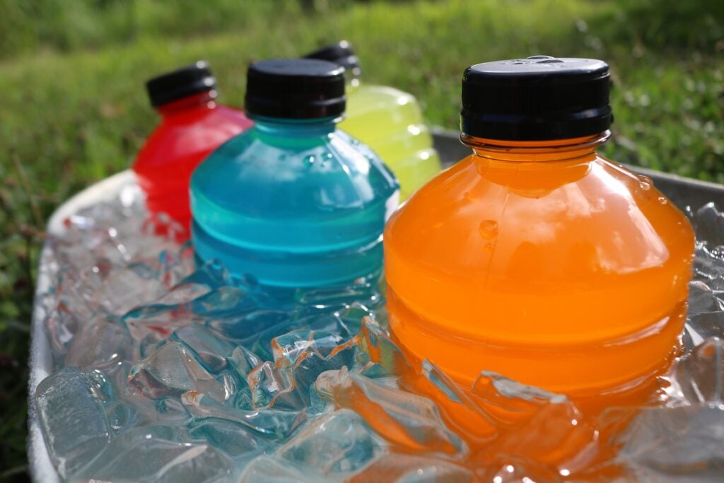 Ice bucket with multi-colored sports drinks