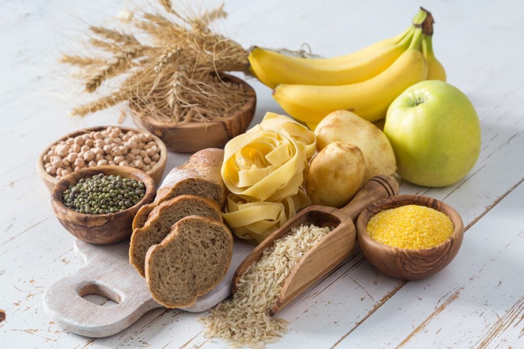 Selection of carbohydrate sources (including grains, pasta, potatoes, bananas and apples)